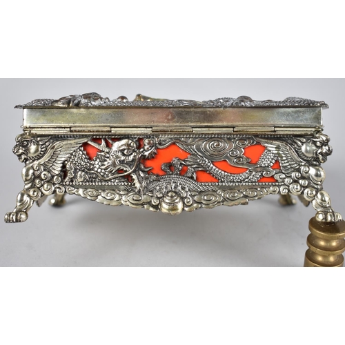 50 - A Mid 20th Century Oriental Musical Box, the Lid and Sides Decorated in Heavy Relief with Palace, Bu... 