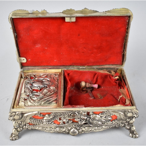 50 - A Mid 20th Century Oriental Musical Box, the Lid and Sides Decorated in Heavy Relief with Palace, Bu... 