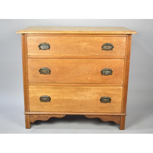 502 - An Edwardian Oak Three Drawer Bedroom Chest, 91cm wide