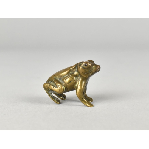 52 - A Collection of Three Small Frogs, in Bronze, Smokey Quartz and Green Flecked Marble