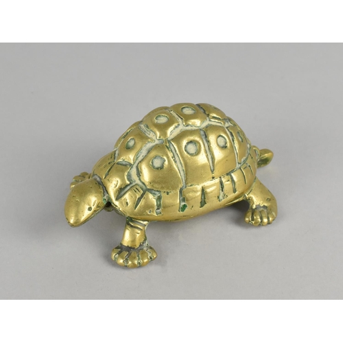 59 - A Novelty Brass Match Holder in the form of a Turtle with a Hinged Shell and Head, 13cm Long