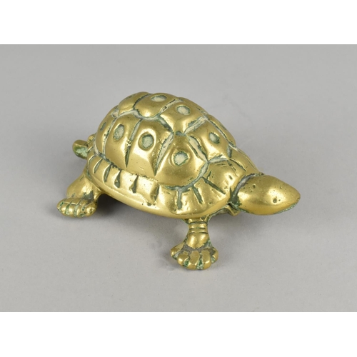 59 - A Novelty Brass Match Holder in the form of a Turtle with a Hinged Shell and Head, 13cm Long