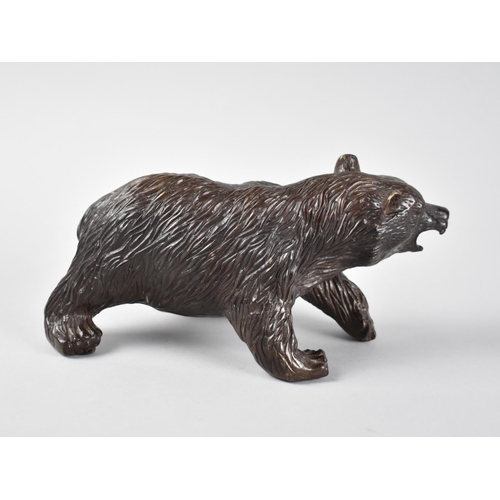 62 - A Heavy Patinated Bronze Study of a Brown Bear, 21cm Long