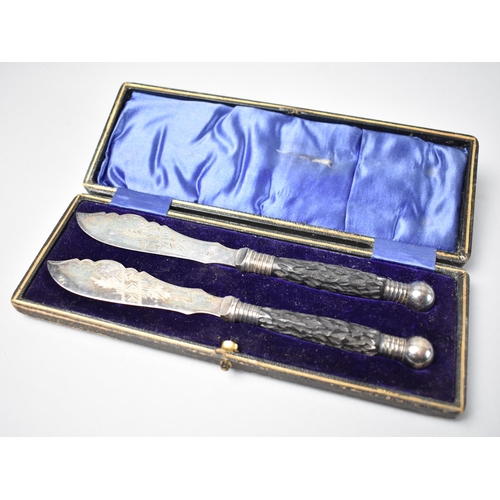 7 - A Pair of Cased Silver Banded Butter Knives with Engraved Blades