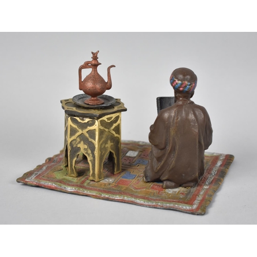 64 - A Reproduction Cold Painted Bronze Novelty Desktop Inkstand in the Form of Kneeling Arabic Gentleman... 