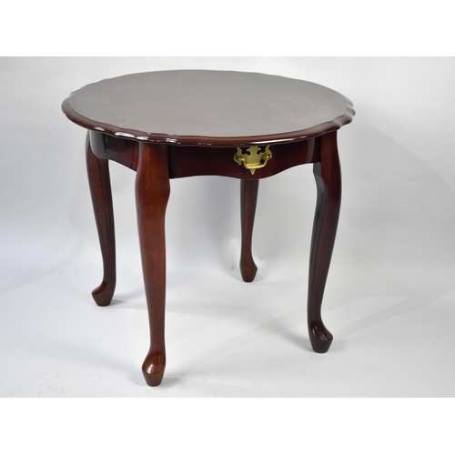 103 - A Circular Mahogany Effect Coffee Table on Cabriole Supports, 61cms Diameter