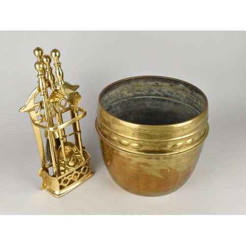 110 - A Small Brass Fireside Companion Set and a Brass Planter/Coal Bucket, 25cms Diameter