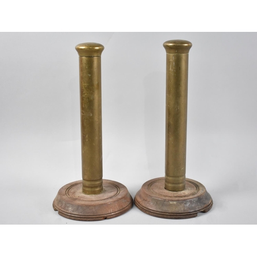 112 - A Pair of Late Victorian Heavy Brass Quoit Pegs on Wooden Bases, 30cms High