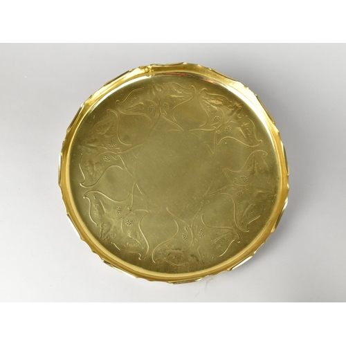 119 - An Art Nouveau Style Brass Circular Wall Hanging Decorated with Vine Leaves and Grapes, 31cms Diamet... 