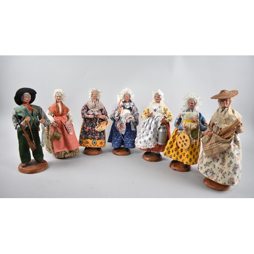 123 - A Collection of French Santon and Marinacci Greoux Terracotta Figures in the Form of Various Trades ... 