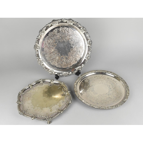 127 - A Selection of Three Silver Plated Salvers, All on Three Bun Feet, One Monogrammed G and Others with... 