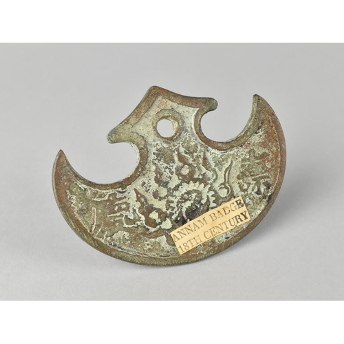 14 - A Patinated Bronze Neck Badge with Paper Label Inscribed 