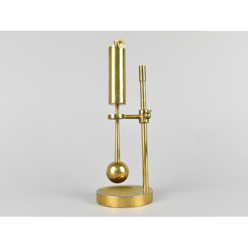 20 - A Reproduction Brass Gimballed Oil Lamp, 23cms High