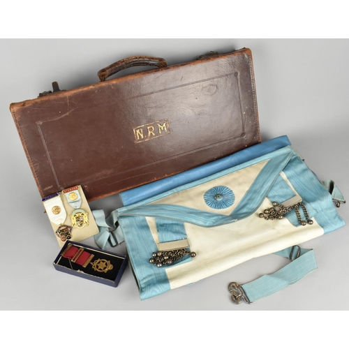 24 - A Vintage Leather Cased Collection of Masonic Jewels and Apron