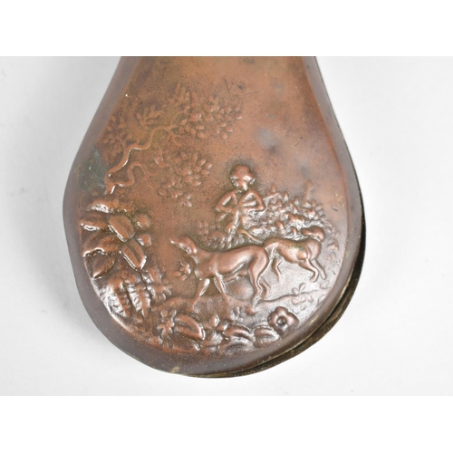 29 - A 19th Century Copper Shot Flask Decorated in Relief, Condition Issues and Split to Seam, 20cms High