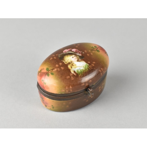 47 - A Continental Ormolu Mounted Oval Pill Box with Hinged Lid, 5cms Long