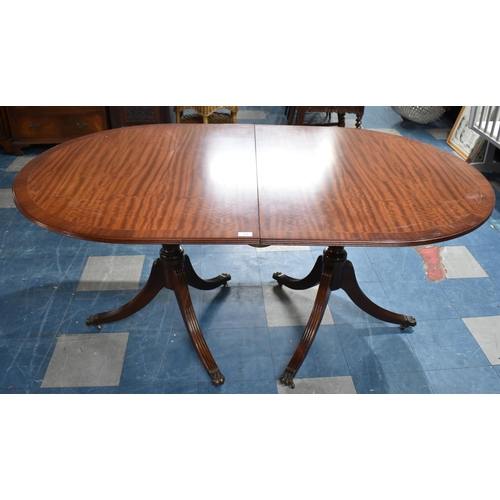 519 - A Modern Mahogany Twin Pedestal Dining Table