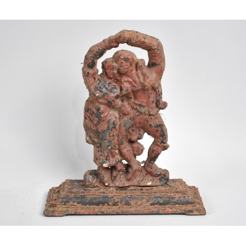 70 - A Late 19th Century Painted Cast Metal Doorstop in the Form of Couple Dancing, 19cms High