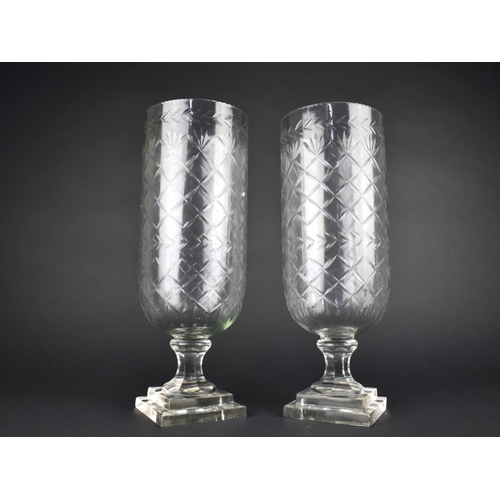 74 - A Pair of Tall Glass Hurricane Vases with Cut Decoration, 40cms High