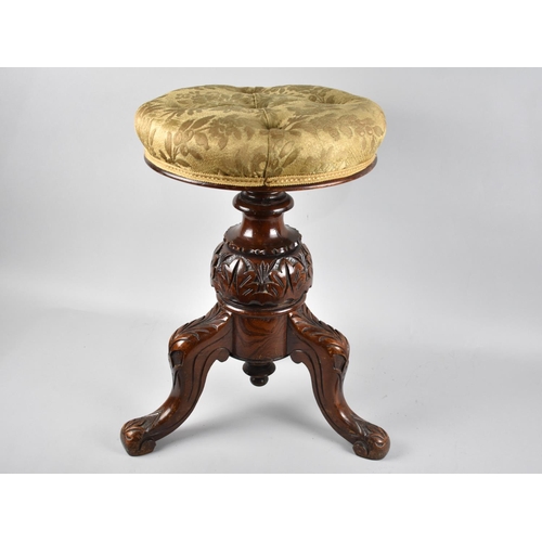 79 - A Late Victorian Carved Mahogany Circular Rise and Fall Piano Stool with Button Upholstered Seat