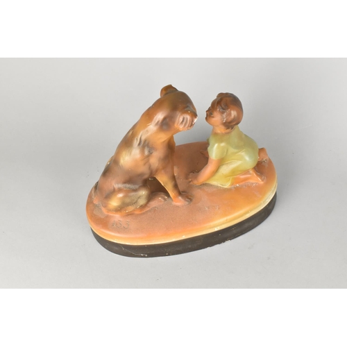 81 - An Early 20th Century Cold Painted Plaster Figure Group of Seated Dog and Young Child, 23cms Long