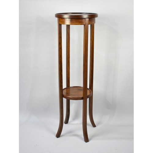 88 - An Edwardian Inlaid Mahogany Circular Torchere Stand with Stretcher Shelf, 32cms Diameter and 98cms ... 