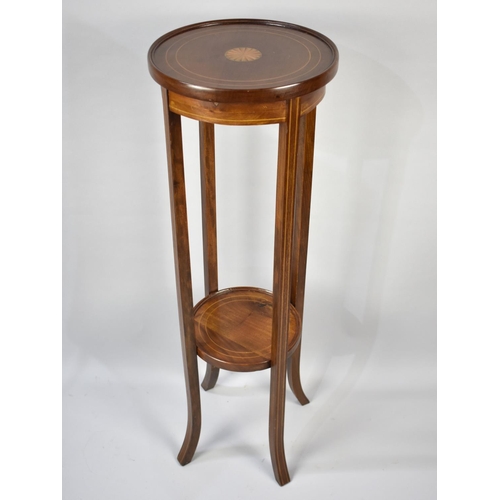 88 - An Edwardian Inlaid Mahogany Circular Torchere Stand with Stretcher Shelf, 32cms Diameter and 98cms ... 