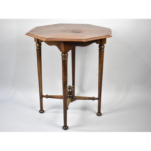 91 - An Edwardian Octagonal Mahogany Occasional Table on Turned Supports and Stretchers, 60cms Diameter