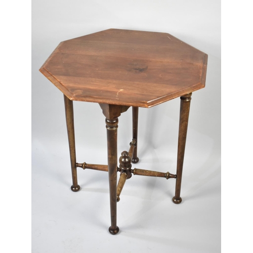 91 - An Edwardian Octagonal Mahogany Occasional Table on Turned Supports and Stretchers, 60cms Diameter