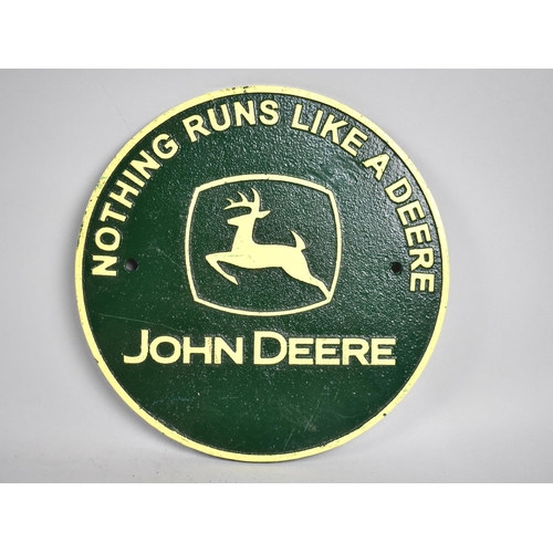 95 - A Reproduction Cold Painted Cast Iron Circular Sign for John Deere, 24cms Diameter