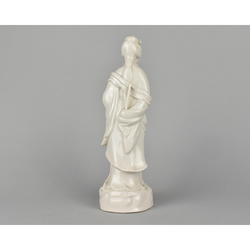 31 - A Chinese Porcelain Blanc de Chine Study of a Standing Fisherman with Net in Hand, 28cm (Missing Fin... 