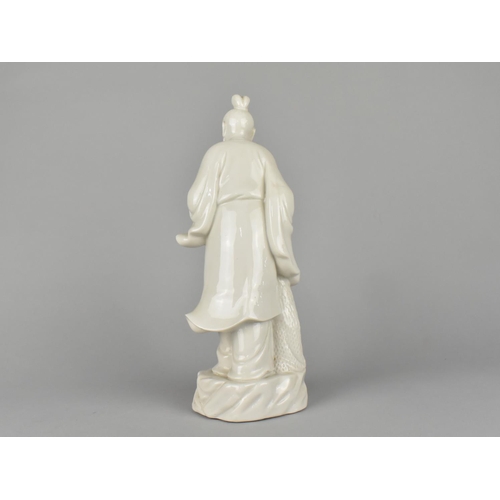 31 - A Chinese Porcelain Blanc de Chine Study of a Standing Fisherman with Net in Hand, 28cm (Missing Fin... 