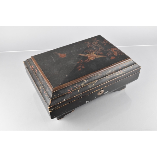 38 - A 19th Century Japanese Black Lacquered Sewing/Work Box of Sarcophagus Form, The Exterior Decorated ... 