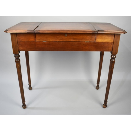 32 - An Edwardian Mahogany Writing Desk, 'The Britisher Desk', having Lift Up Central Section with Statio... 