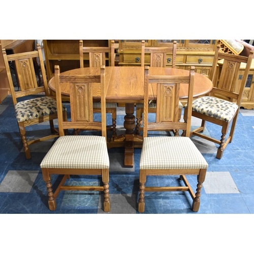 482 - A Late 20th Century Oak Old Charm Drop Leaf Dining Table together with Six Old Charm Gothic Revival ... 