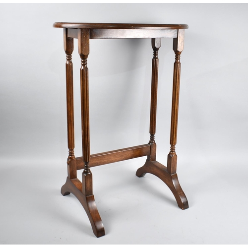 499 - A Modern Mahogany Oval Occasional Table with Reeded Supports, In Need of Repolish, 47cms Wide