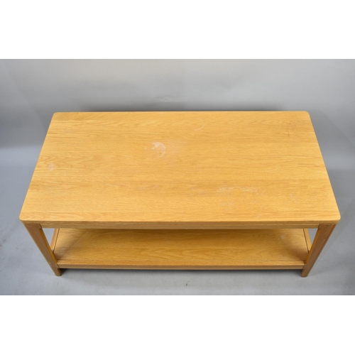 506 - A Modern Rectangular Two Tier Coffee Table, 110x55cms