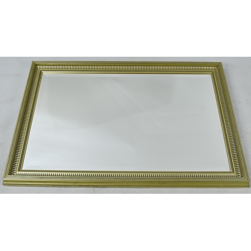 518 - A Large Modern Framed Wall Mirror, 67x98cms