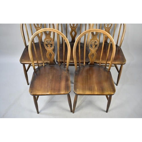 535 - A Set of Five Ercol Wheelback Fleur De Lys Chairs