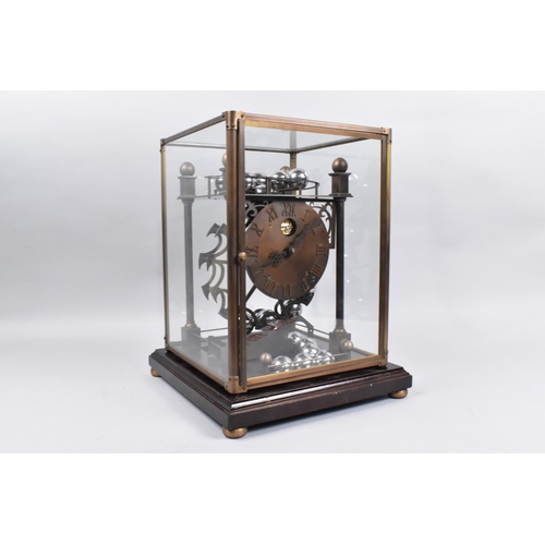 54 - A Late 20th Century Spherical Weight Clock with Twenty Chrome Balls which Travel on Feeding Rails, i... 