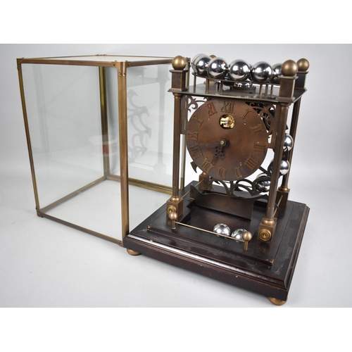 54 - A Late 20th Century Spherical Weight Clock with Twenty Chrome Balls which Travel on Feeding Rails, i... 