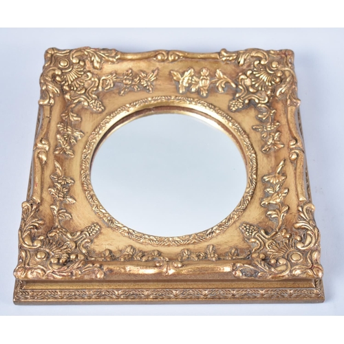 70 - A Reproduction Gilt Framed Circular Wall Mirror, 28cms Square Overall