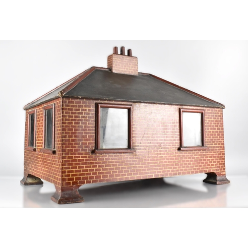 78 - An Early/Mid 20th Century Dolls House in the form of a Red Brick Bungalow Having Two Opening Doors a... 