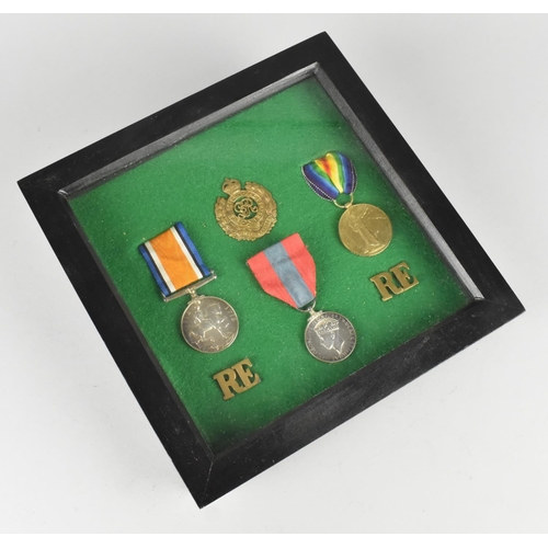 119 - A Framed Collection of Royal Engineers Badges, Two WWI Medals and WWII Medal Awarded to Sapper Walte... 