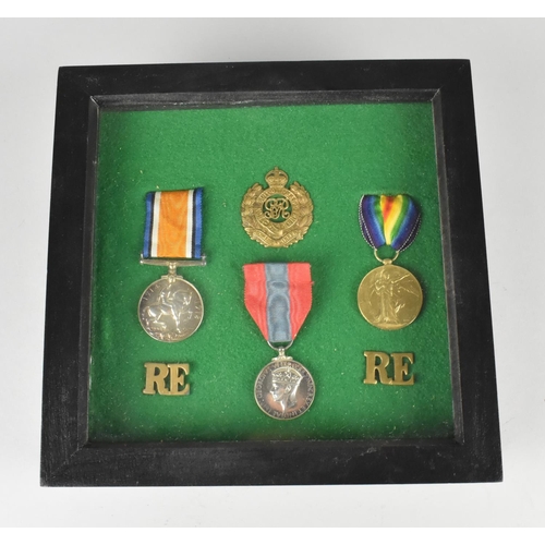 119 - A Framed Collection of Royal Engineers Badges, Two WWI Medals and WWII Medal Awarded to Sapper Walte... 