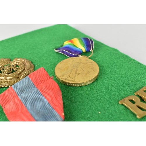 119 - A Framed Collection of Royal Engineers Badges, Two WWI Medals and WWII Medal Awarded to Sapper Walte... 