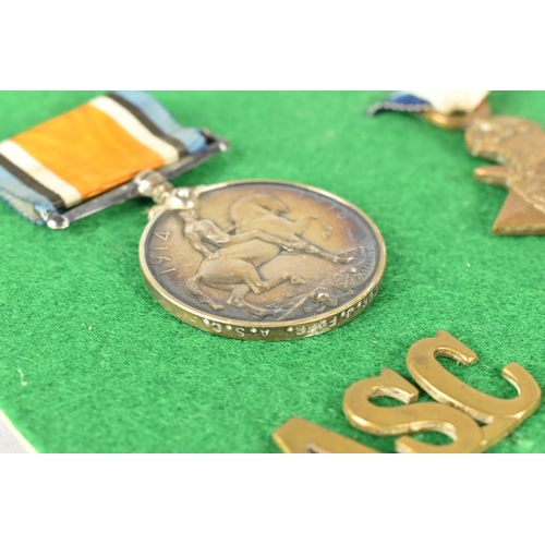 120 - A Framed Collection of WWI Medals and Military Badges Awarded to Driver J Farr, Army Service Corps