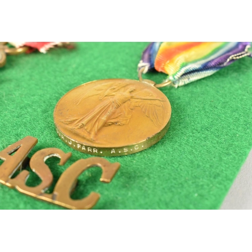 120 - A Framed Collection of WWI Medals and Military Badges Awarded to Driver J Farr, Army Service Corps