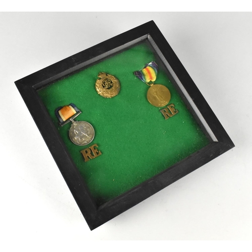 121 - A Framed Royal Engineers Badge and Two WWI Medals Awarded to 63458 Sapper JH Crew, Royal Engineers