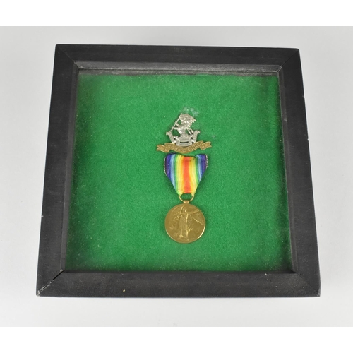 122 - A Single WWI Medal and Military Badge for No.235476 Pte G E Woodward, West Riding Regiment, With Pri... 